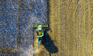 Aerial Shot of Green Milling Tractor