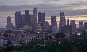 The Los Angeles city skyline is seen from a hilltop