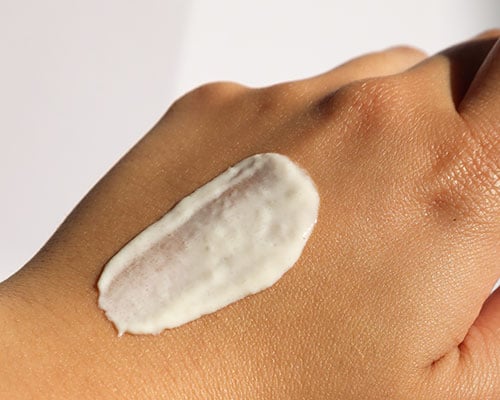 Sunscreen on hand banner ad